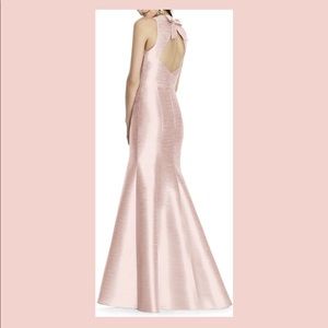 Beautiful open back glistening trumpet gown